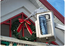 giant outdoor building front wreath Christmas decoration installation